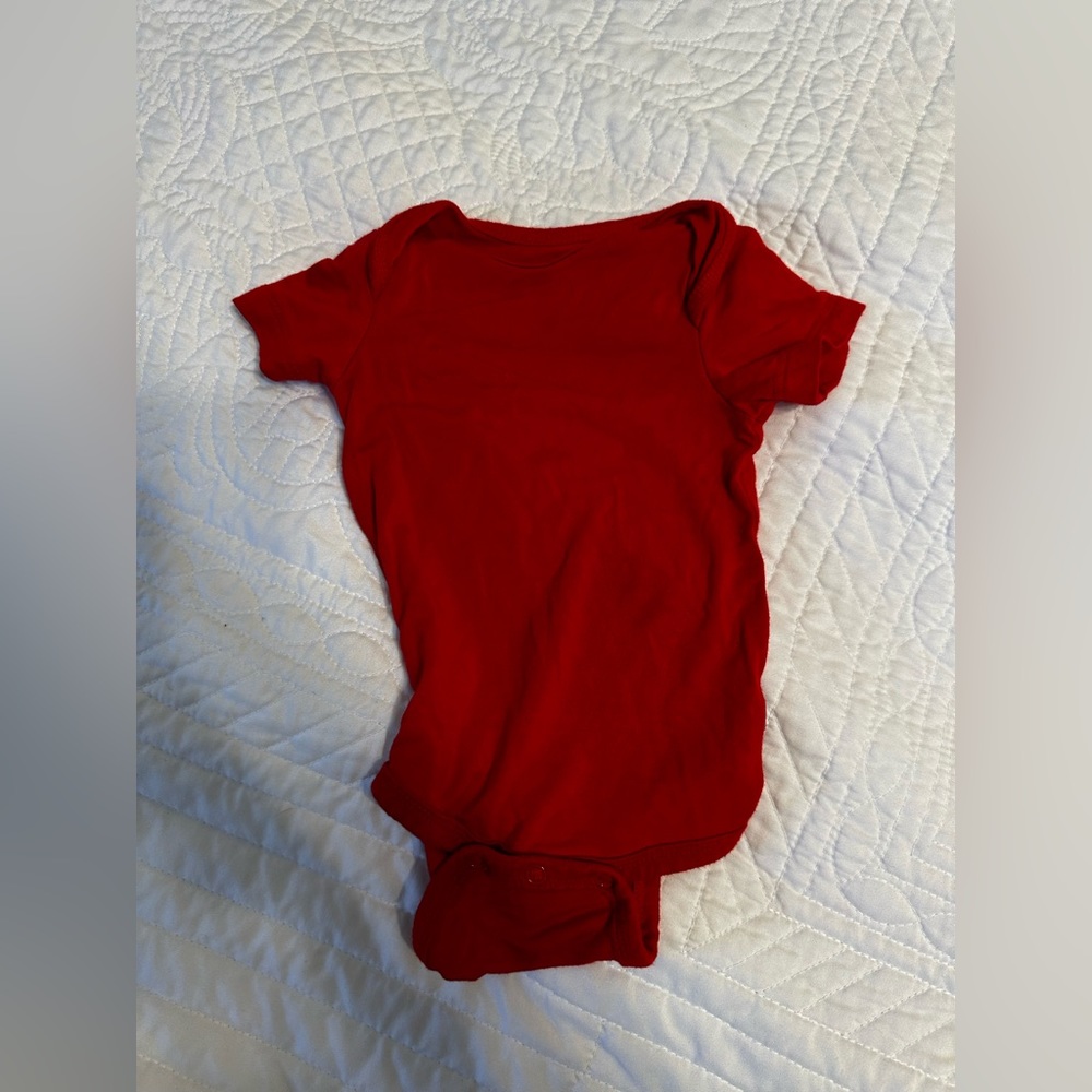 Kyte baby red bodysuit